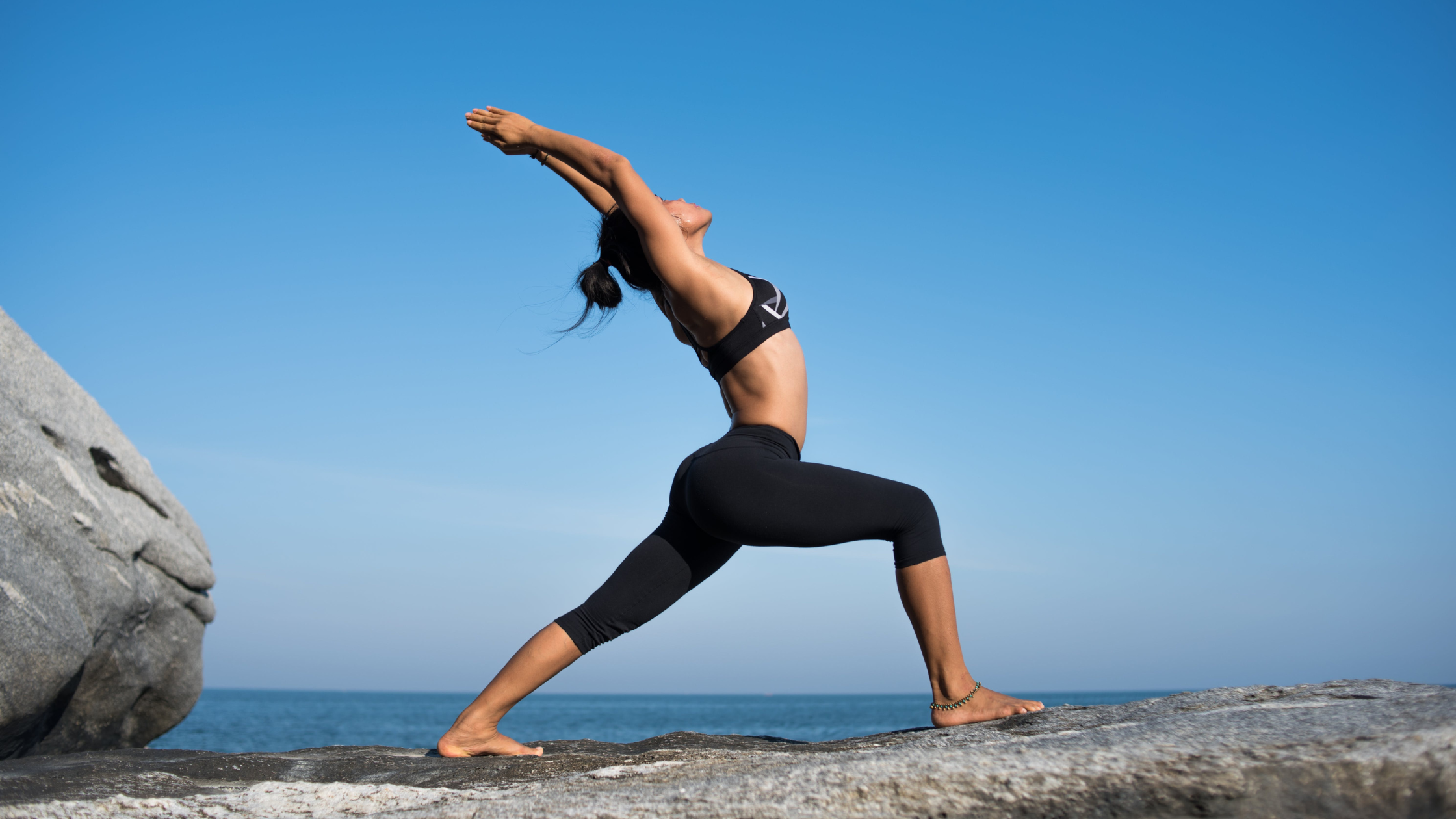 Woman in yoga strength pose